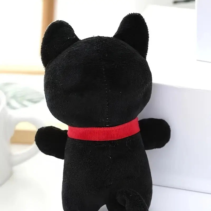 Black plush cat-shaped toy with red collar, a durable kitten chewing plaything