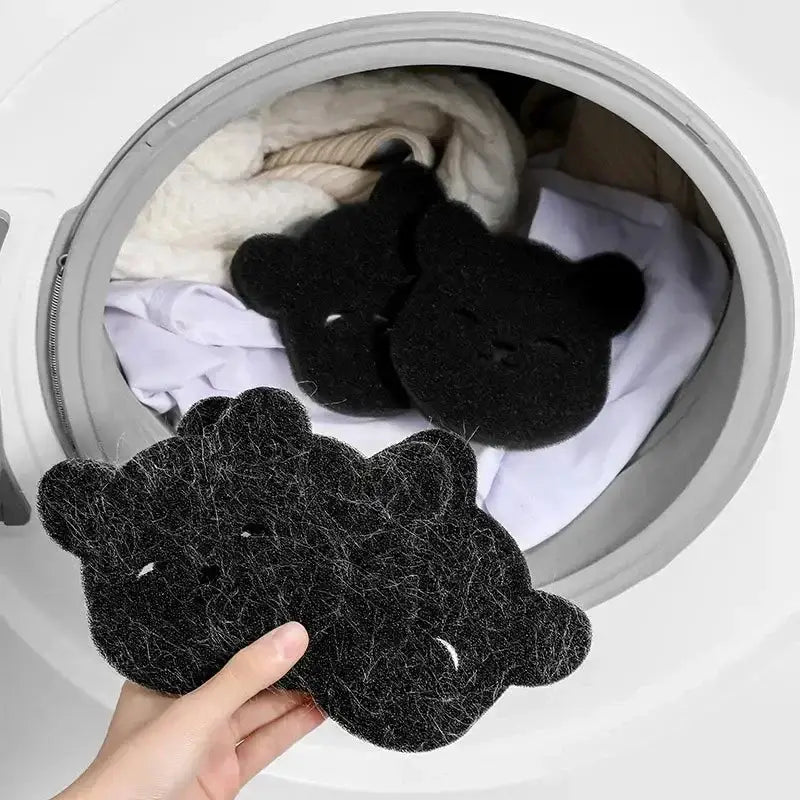 Black bear-shaped laundry balls for effective pet hair removal in washing machines