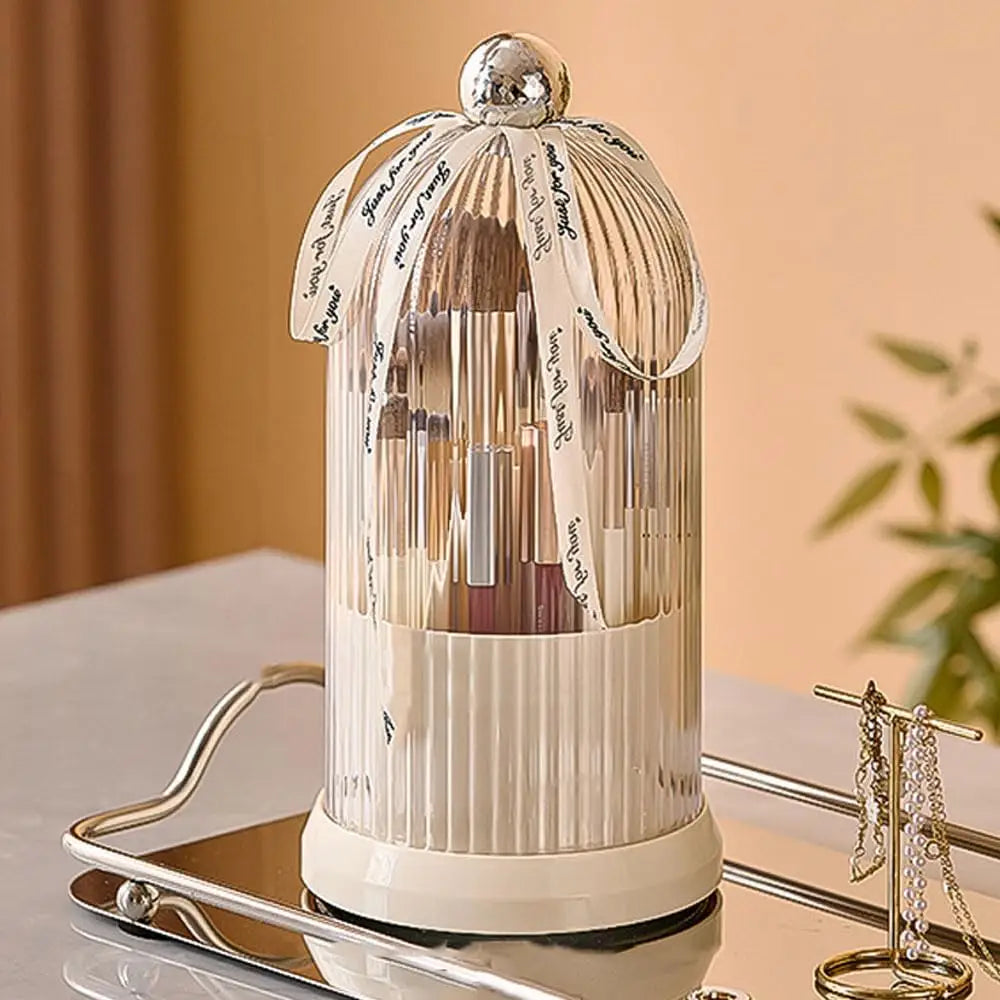 Ribbed white cosmetic organizer with ribbon and clear lid for makeup brushes on Vanity
