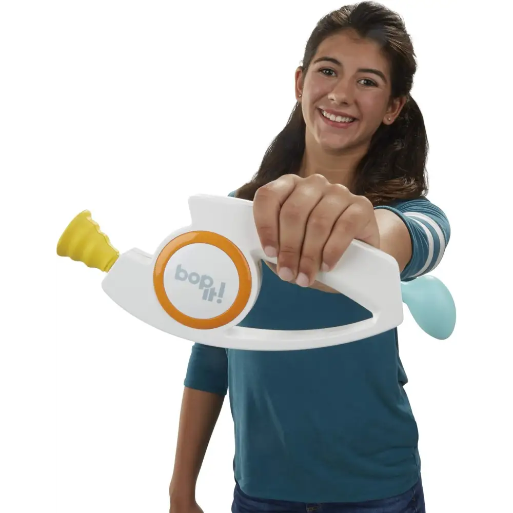 White and orange Hasbro Gaming Bop It! Electronic Game for classic dexterity games fun