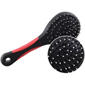 Black and red hairbrush for grooming dogs and cats with a double sided pet brush design