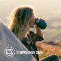 Woman enjoying a beverage from a dishwasher safe tumbler by STANLEY