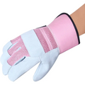 Pink and white thorn proof work gloves featuring a leather palm for durable gardening use