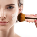 Makeup foundation application with UNIMEIX Retractable Kabuki Brush for flawless coverage