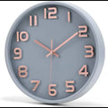 Gray wall clock with rose gold numbers, a stylish silent non-ticking quartz decorative piece