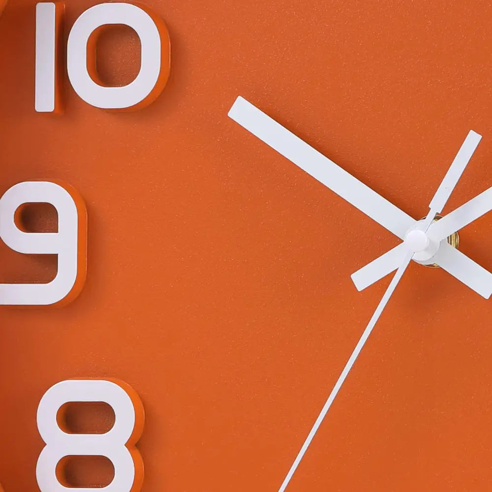 Orange decorative wall clock with white numerals and hands, silent non-ticking quartz design