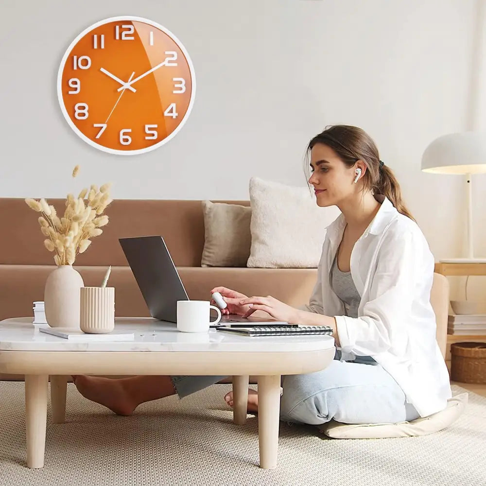 Orange wall clock, a decorative wall clock featuring silent non-ticking quartz technology